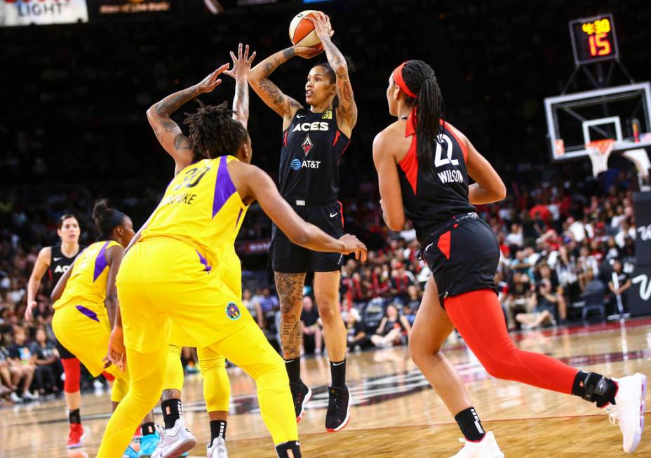 Las Vegas Aces' Tamera Young (1) shoots against the Los Angeles Sparks during the first half of ...