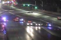 Las Vegas police close off southbound Rainbow Boulevard, north of Charleston Boulevard, on Satu ...