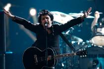 Billie Joe Armstrong, from Green Day, performs at the 37th Annual American Music Awards on Sun ...