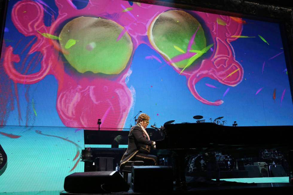 Elton John performs onstage during his "Farewell Yellow Brick Road" final tour at Mad ...