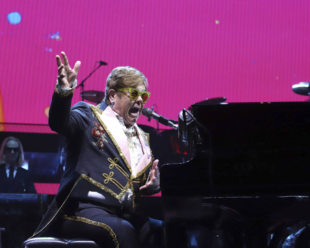 Elton John performs onstage during his "Farewell Yellow Brick Road" final tour at Mad ...