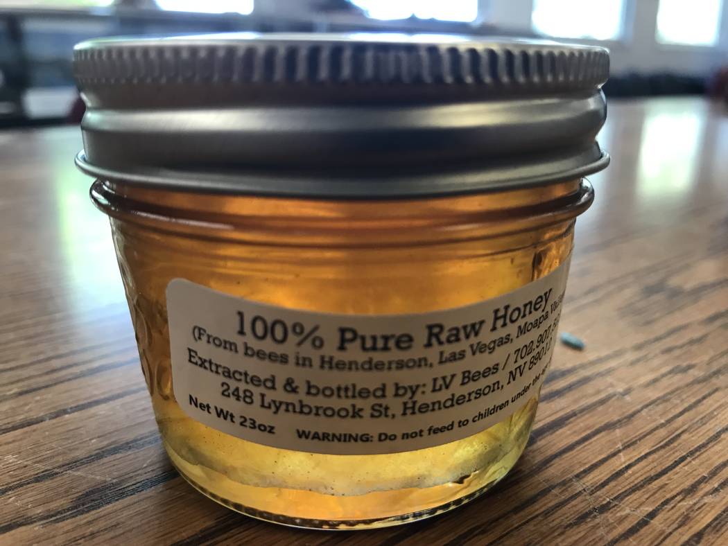 A jar of honey produced by bees at the Henderson Bird Viewing Preserve is shown Aug. 28. (Julie ...