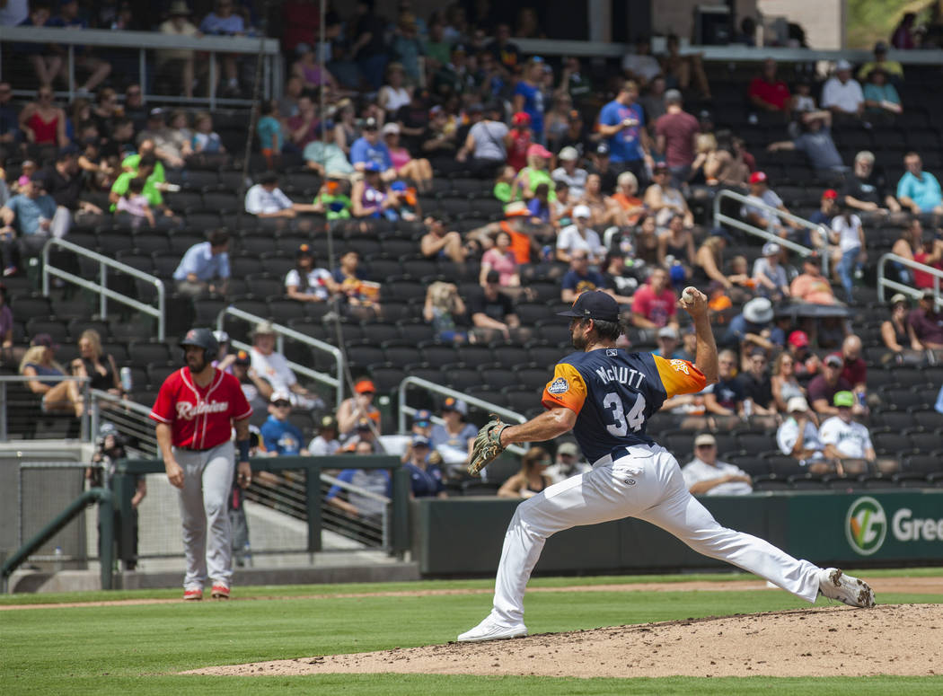 Las Vegas Aviators pitcher Trey McNutt winds a pitch against the Tacoma Rainiers in the third i ...