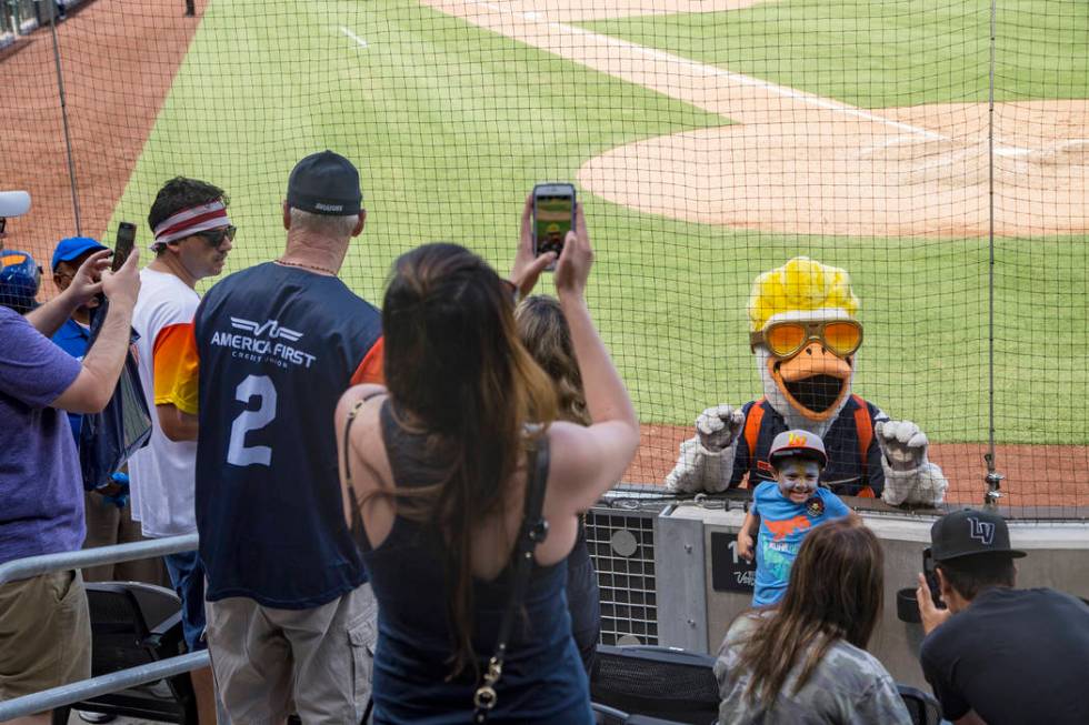 The Spruce the Goose mascot takes photos with fans at the Las Vegas Ballpark in Downtown Summer ...