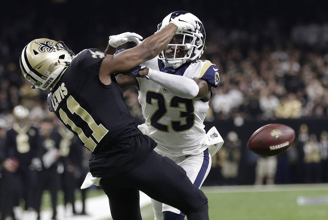 Los Angeles Rams' Nickell Robey-Coleman breaks up a pass intended for New Orleans Saints' Tommy ...