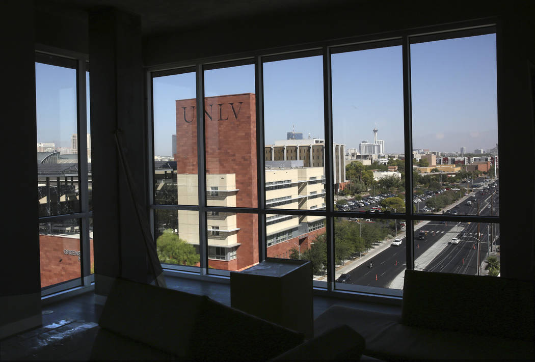 The view of Maryland Parkway and the Strip as seen from the common area of a six bedroom apartm ...
