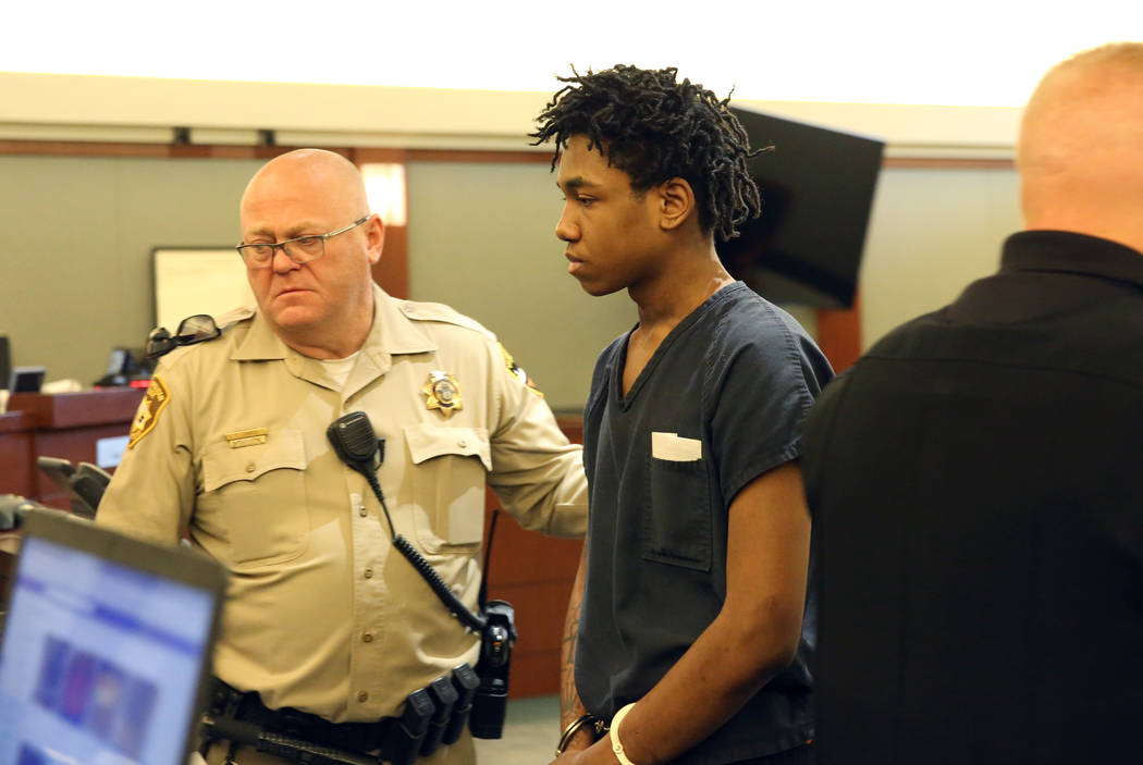 Damion Dill, accused of killing 11-year-old Angelina Erives, led out of the courtroom after his ...