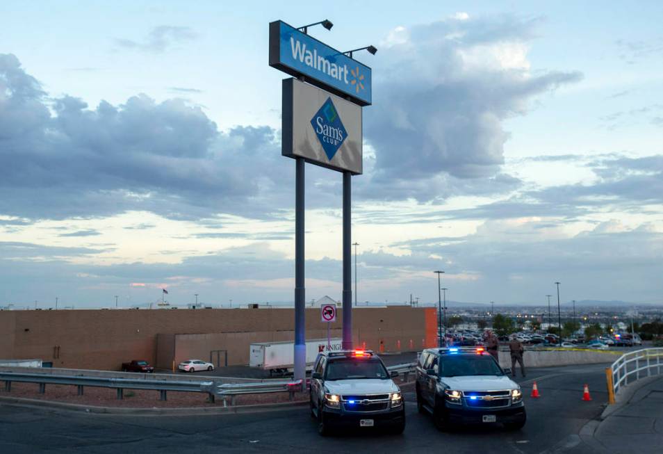 FILE - In this Aug. 3, 2019, photo texas state police cars block the access to the Walmart stor ...