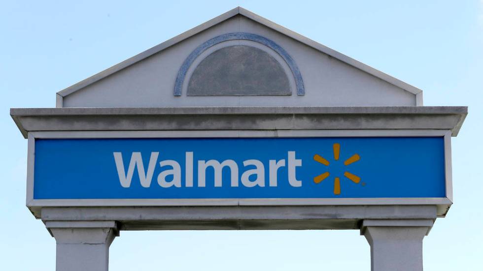 A Walmart logo forms part of a sign outside a Walmart store, Tuesday, Sept. 3, 2019, in Walpole ...