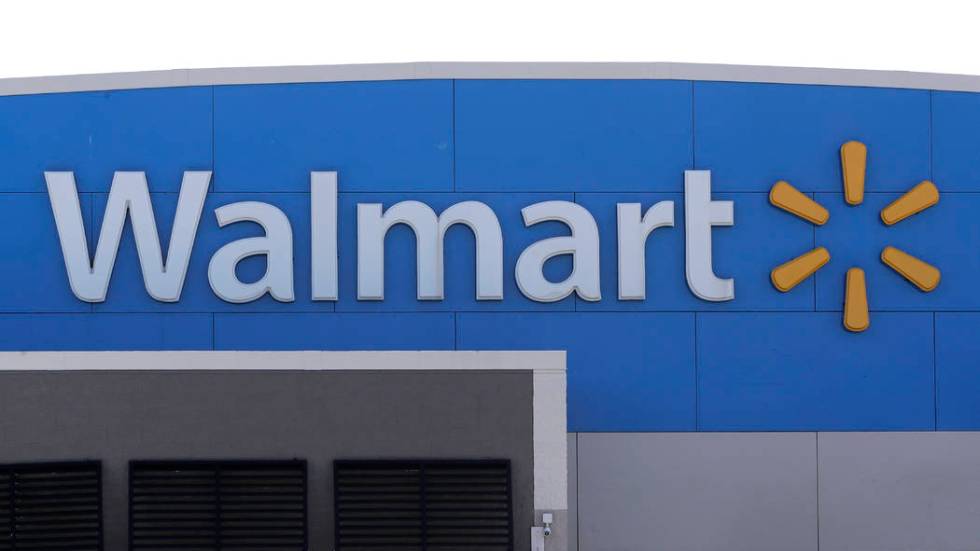 A Walmart logo is attached to the outside of a Walmart store, Tuesday, Sept. 3, 2019, in Walpol ...