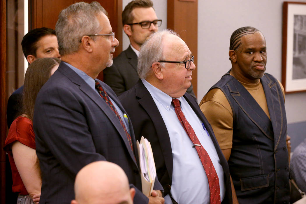 Defense attorney Ozzie Fumo, from left, his law partner Tom Pitaro and client, Ray Jefferson, a ...