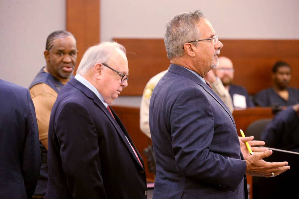 Defense attorney Ozzie Fumo, right, argues during a court hearing at the Regional Justice Cente ...