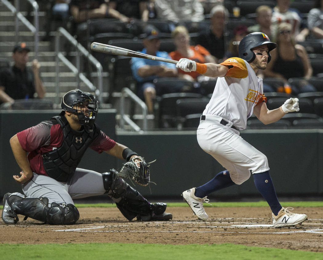 Las Vegas Aviators left fielder Mark Payton (16) doubles in a run in the bottom of the first in ...