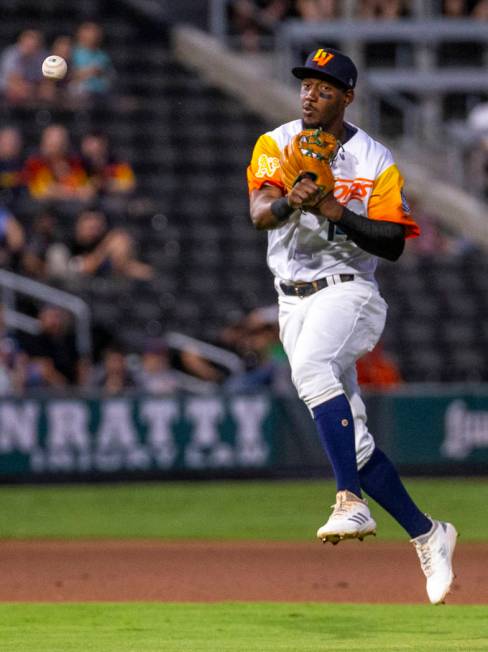 Las Vegas Aviators shortstop Jorge Mateo (14) throws a ball to first base for an out versus the ...