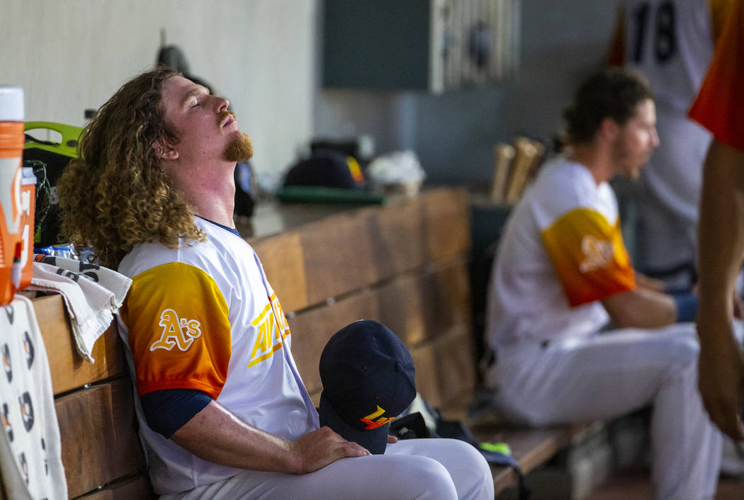 Las Vegas Aviators pitcher Grant Holmes (11) closes his eyes in the dugout versus the Sacrament ...