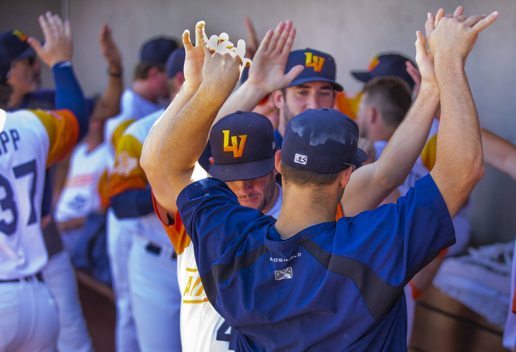 Las Vegas Aviators players get pumped up as they face the Sacramento River Cats during game fi ...