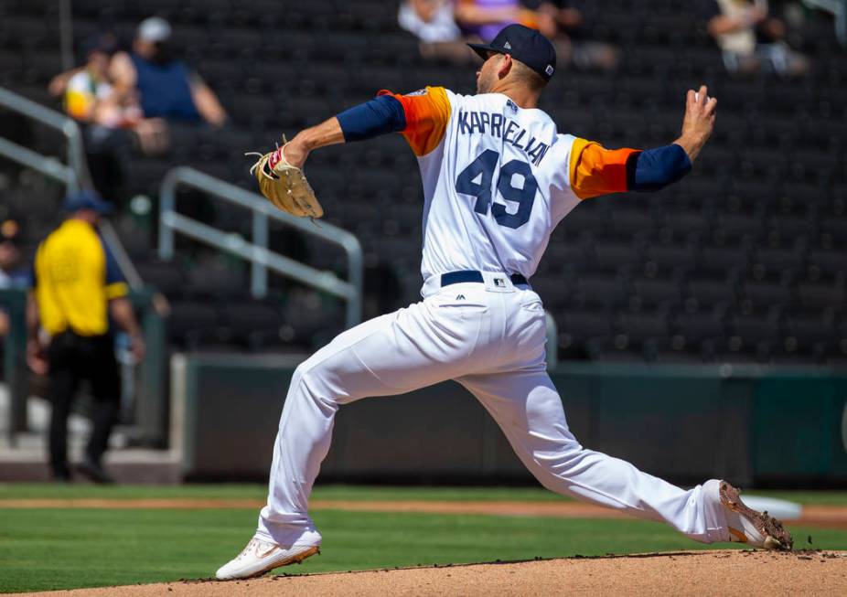 Las Vegas Aviators pitcher James Kaprielian (49) winds up on the mound in the first inning vers ...