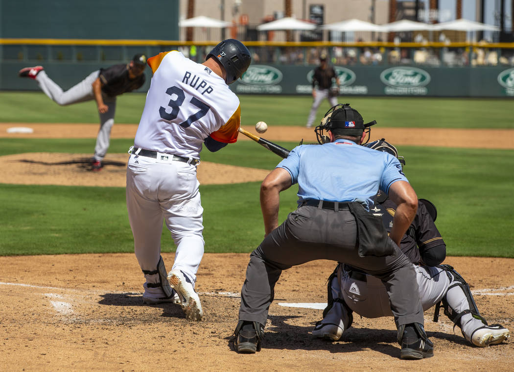 Las Vegas Aviators catcher Cameron Rupp (37) swings on another pitch by the Sacramento River Ca ...