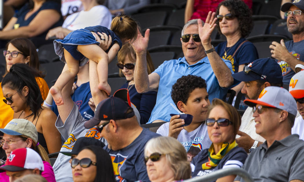 Las Vegas Aviators have fun and stay cool in the shade in the sixth inning as the team battles ...