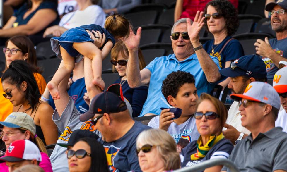 Las Vegas Aviators have fun and stay cool in the shade in the sixth inning as the team battles ...