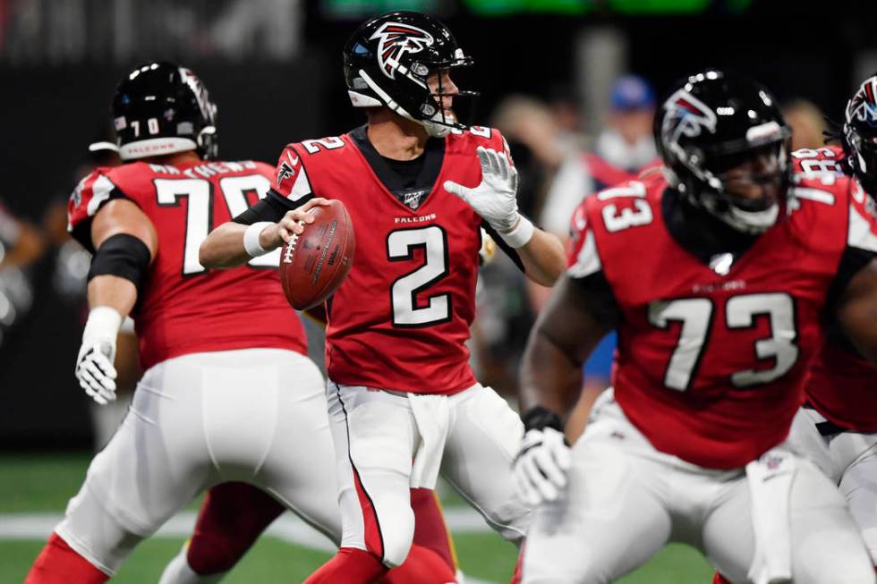 Atlanta Falcons quarterback Matt Ryan (2) works in the pocket against the Washington Redskins d ...