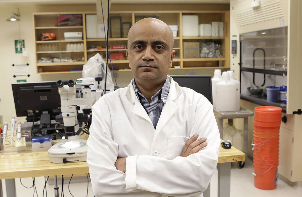 Kumud Acharya, CTO for WaterStart, poses for a photo in his lab at Desert Research Institute Th ...