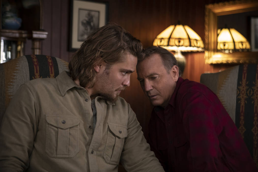 Kayce (L-Luke Grimes) talks with his father (R-Kevin Costner) and decides to track down evidenc ...