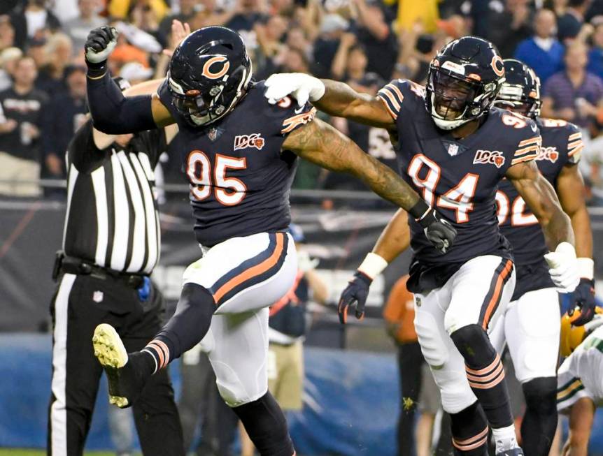 Chicago Bears' Roy Robertson-Harris reacts after sacking Green Bay Packers' Aaron Rodgers durin ...