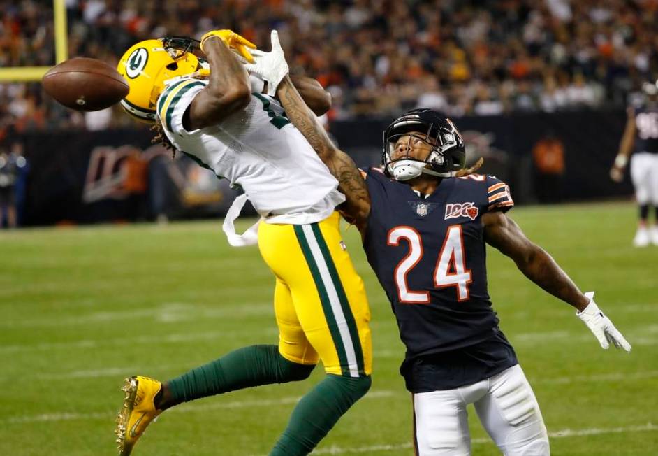 Chicago Bears' Buster Skrine breaks up a pass intended for Green Bay Packers' Davante Adams dur ...