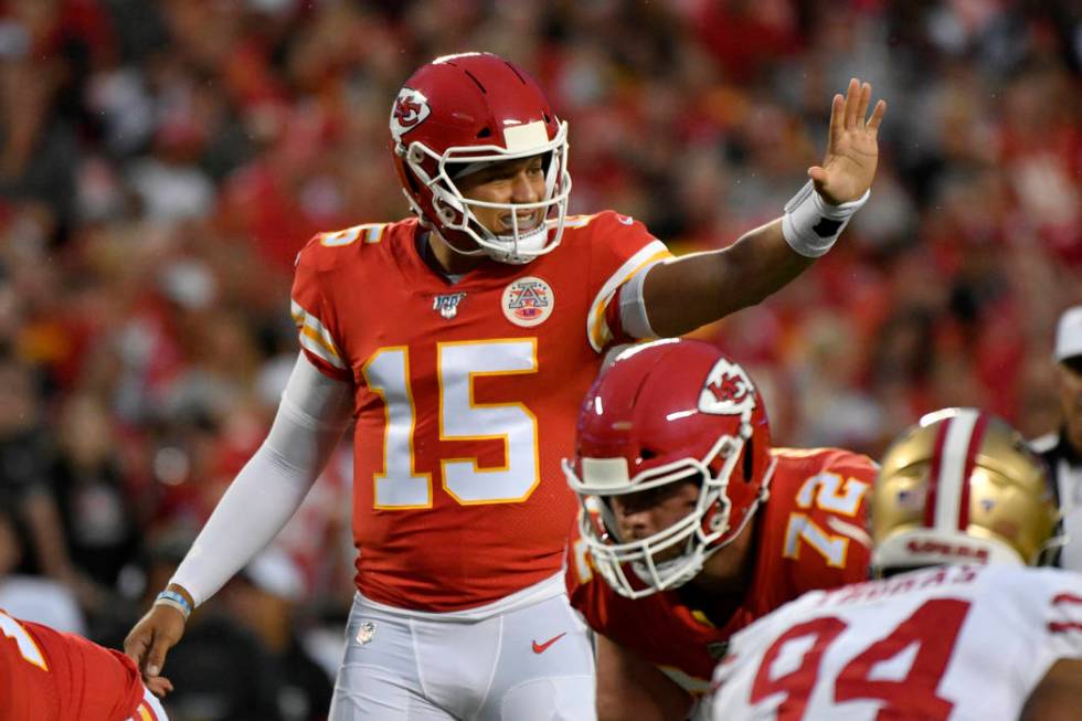 Kansas City Chiefs quarterback Patrick Mahomes (15) gestures during the first half of an NFL pr ...