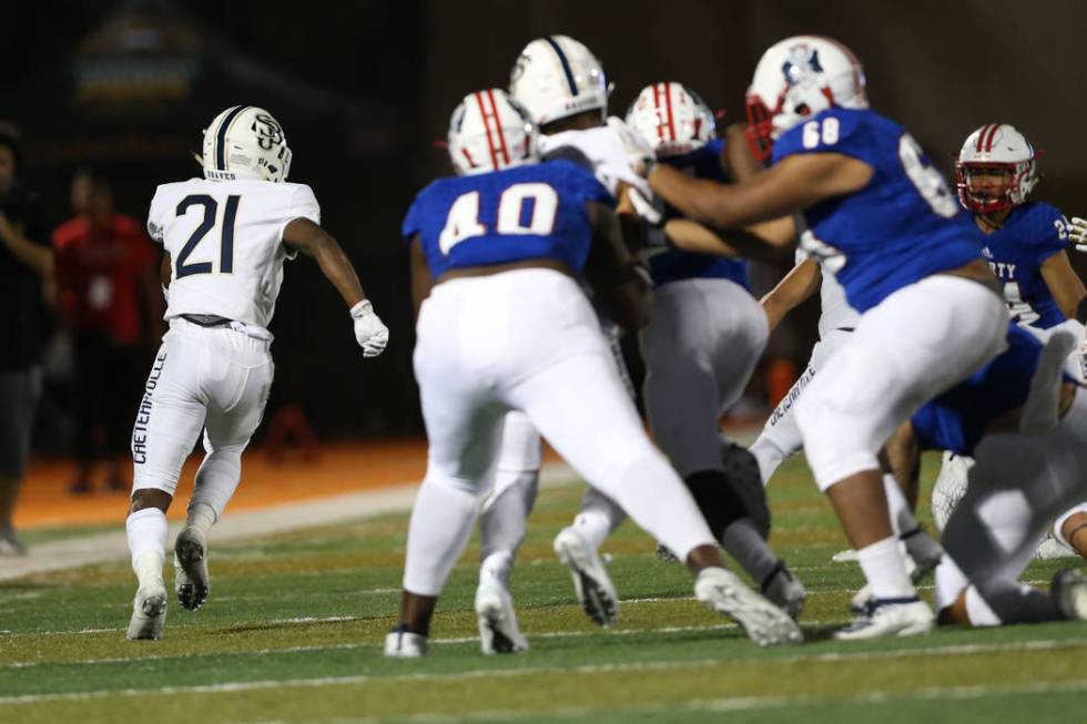 St. John Bosco's Rayshon Luke (21) runs the ball for a touchdown against Liberty during the sec ...