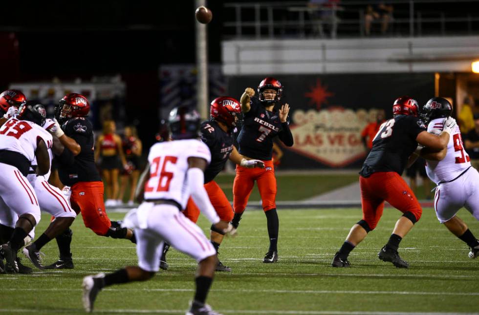 UNLV Rebels quarterback Kenyon Oblad (7) throws a pass during the second half of an NCAA footba ...