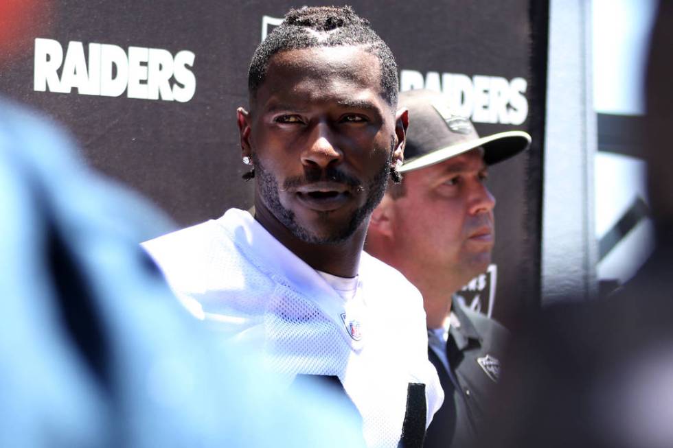Oakland Raiders wide receiver Antonio Brown (84) answers questions during a press conference af ...