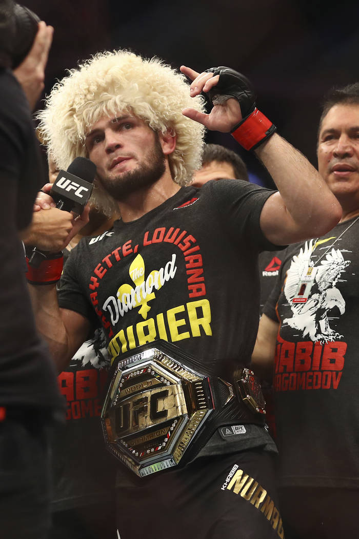 Russian UFC fighter Khabib Nurmagomedov speaks after wining against UFC fighter Dustin Poirier, ...