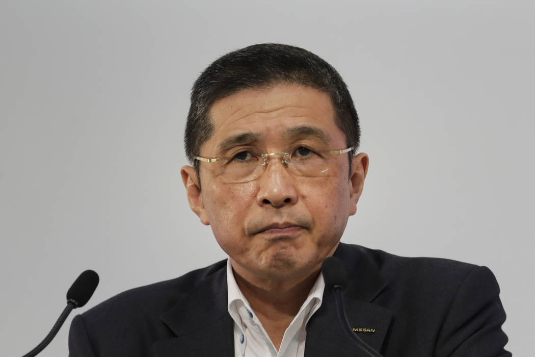 FILE - In this July 25, 2019, file photo, Nissan CEO Hiroto Saikawa listens to questions from t ...