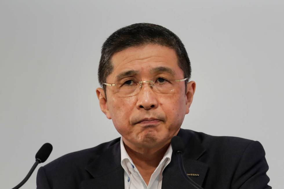 FILE - In this July 25, 2019, file photo, Nissan CEO Hiroto Saikawa listens to questions from t ...