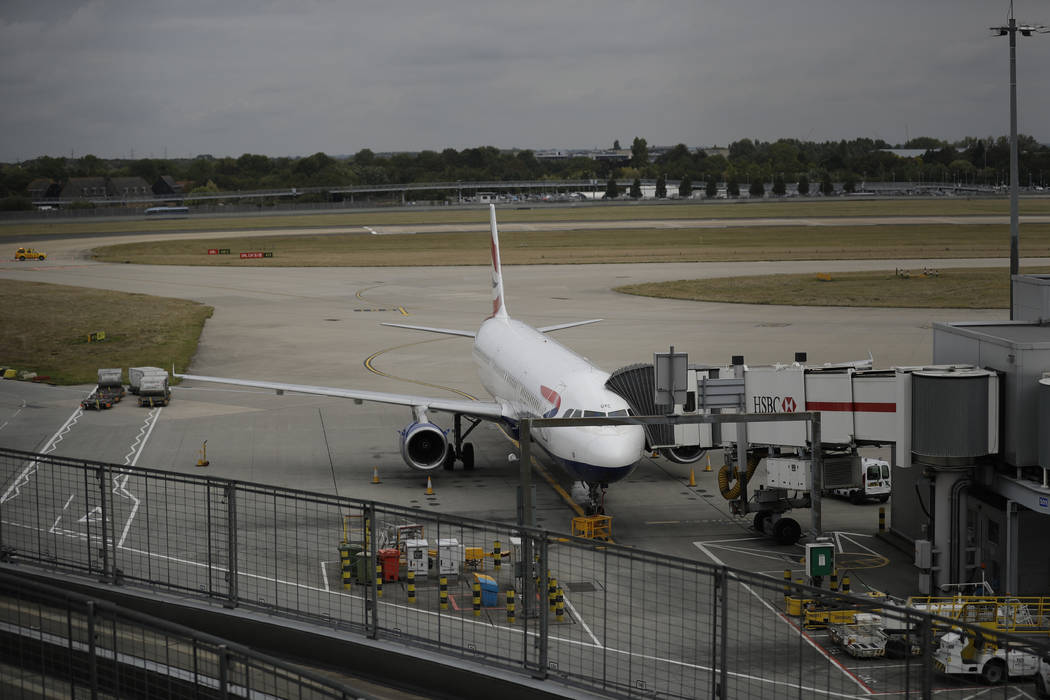 A British Airways plane sits parked at Heathrow Airport in London, Monday, Sept. 9, 2019. Briti ...