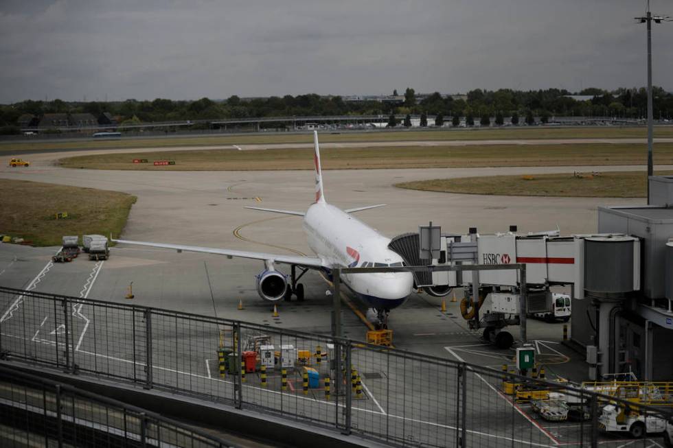 A British Airways plane sits parked at Heathrow Airport in London, Monday, Sept. 9, 2019. Briti ...