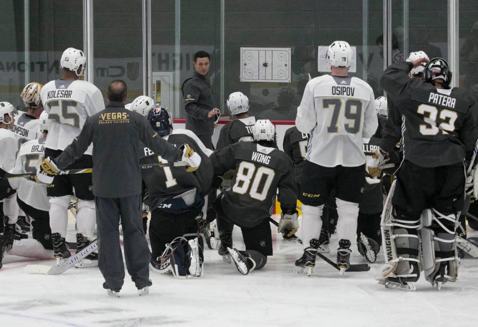 Chicago Wolves coach Rocky Thompson lays out a practice plan for the Vegas Golden Knights durin ...