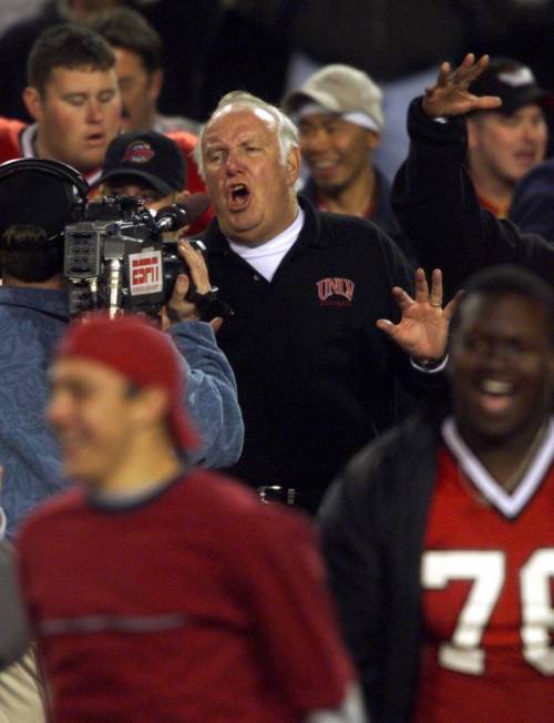 UNLV Head coach John Robinson talks to ESPN cameras immediately after the Rebels beat the Unive ...