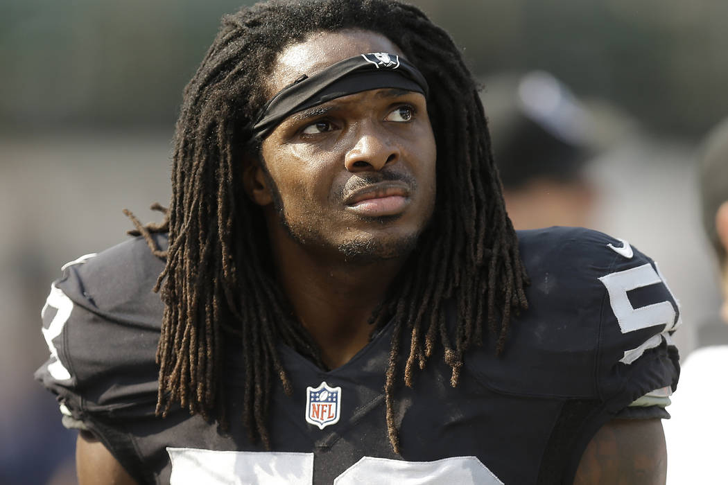 Former Oakland Raiders outside linebacker Neiron Ball (58) stands on the sideline during the se ...