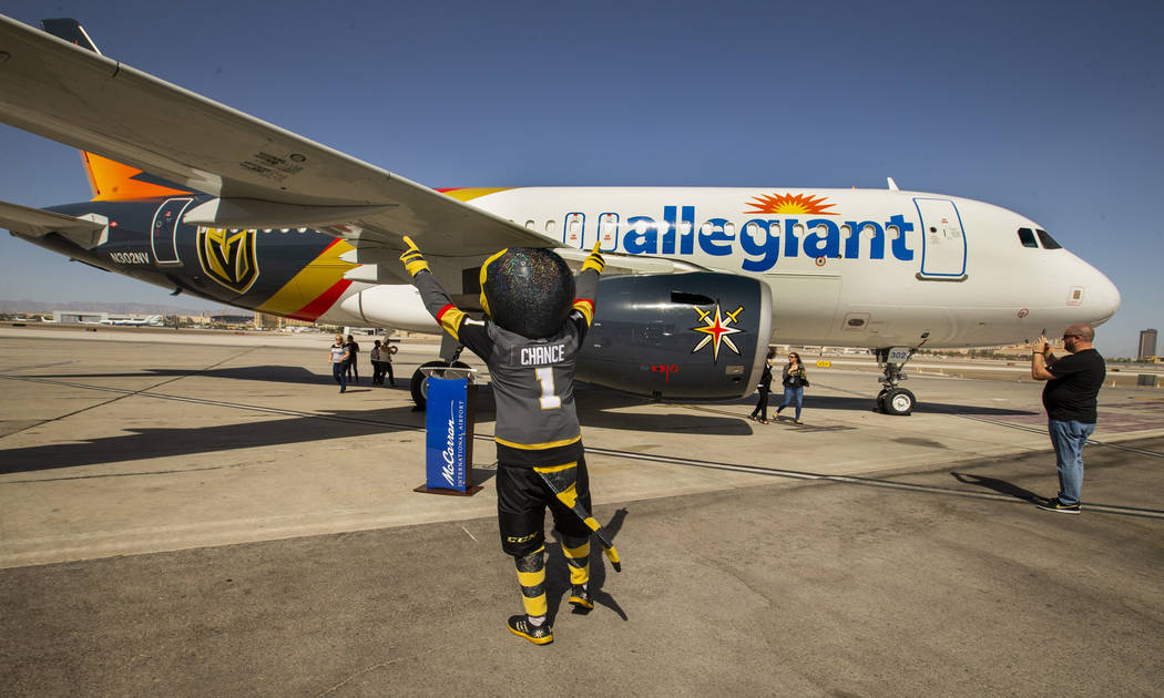 Chance the Gila monster salutes the new plane as Allegiant unveils a new Golden Knights-themed ...