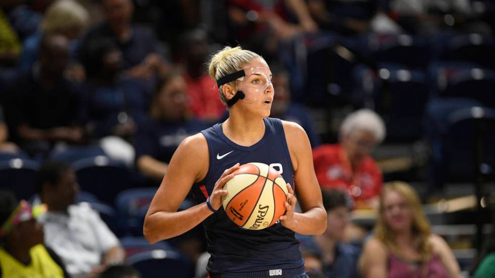 Washington Mystics forward Elena Delle Donne holds the ball during the first half of an WNBA ba ...