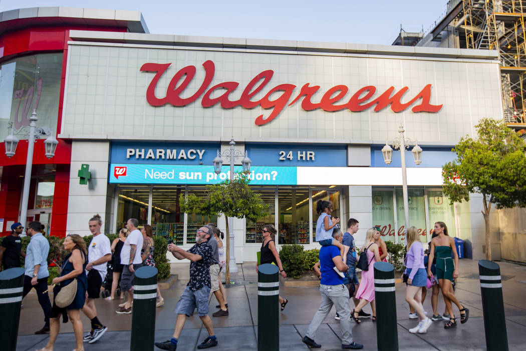 People walk by the Walgreens on the Las Vegas Strip on Tuesday, Sept. 10, 2019, in Las Vegas. T ...