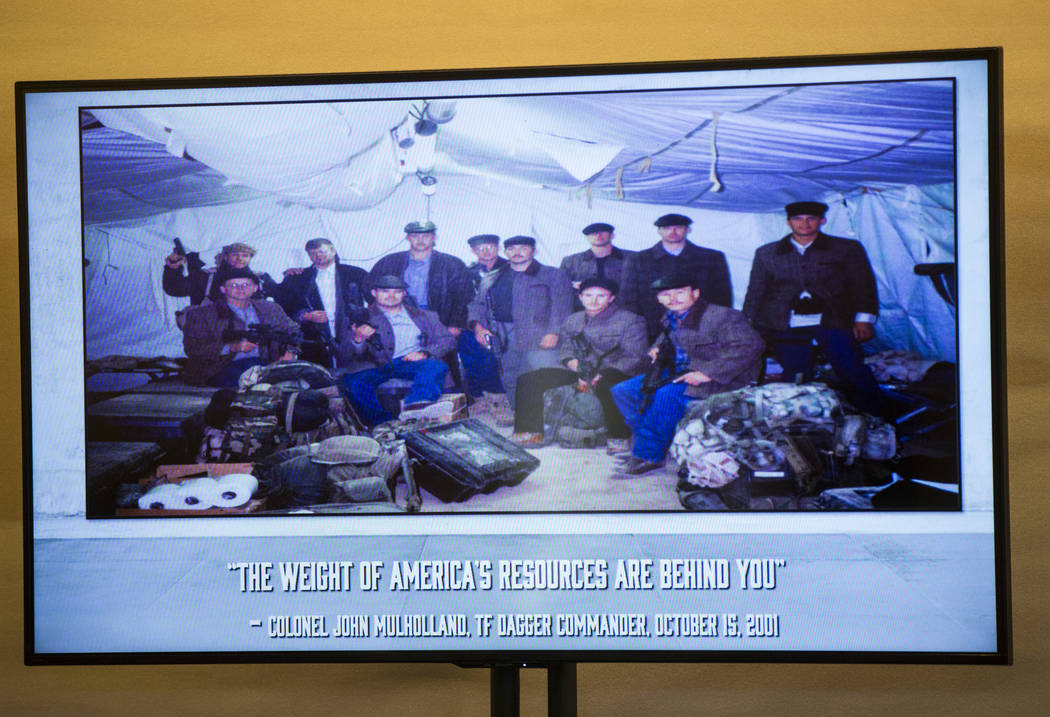 A group photo of the "Horse Soldiers" dressed in local wear as pictured while they we ...