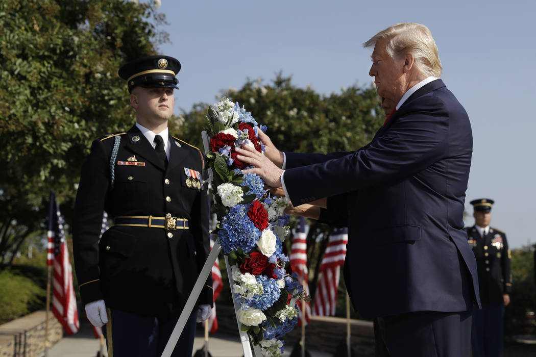 President Donald Trump and first lady Melania Trump place a wreath and will participate in a m ...