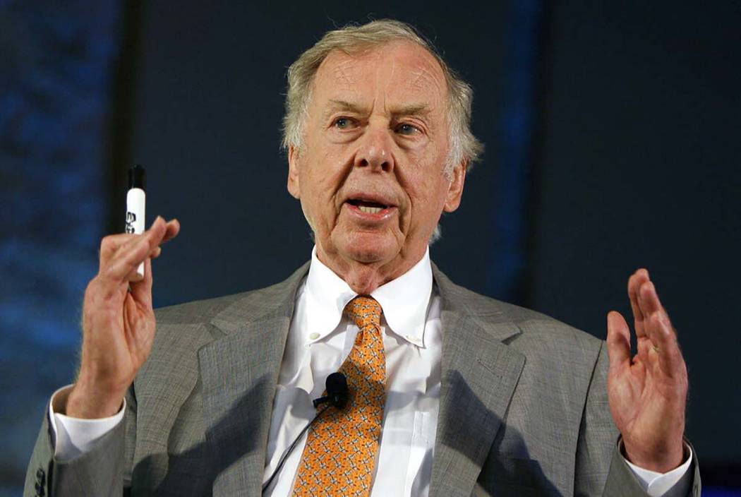 In a July 30, 2008, file photo, oil and gas developer T. Boone Pickens addresses a town hall me ...