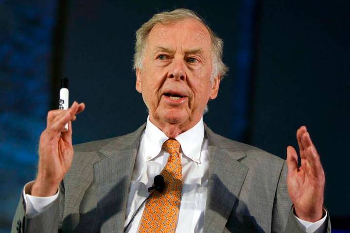 In a July 30, 2008, file photo, oil and gas developer T. Boone Pickens addresses a town hall me ...