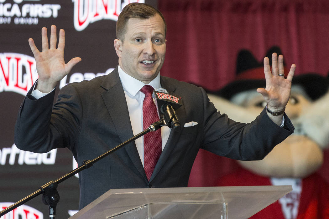 New UNLV men's basketball coach T.J. Otzelberger addresses the crowd at the Strip View Pavilion ...