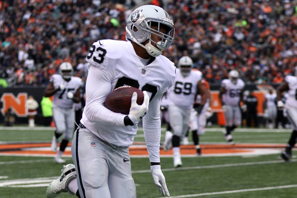 Oakland Raiders tight end Darren Waller (83) runs with the football after making a catch during ...